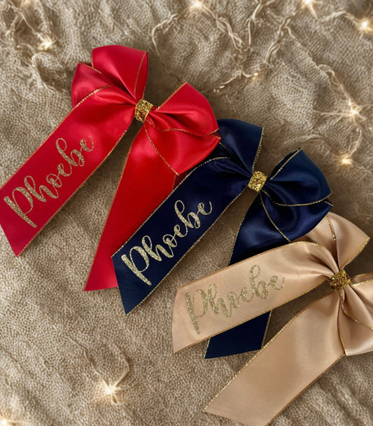 Personalised Christmas satin hair bow with glitter trim